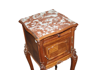 French bedside table in Louis Philippe style with carvings and marble top, 19th century