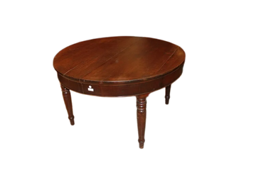 Large circular extendable table from the early 19th century in walnut wood