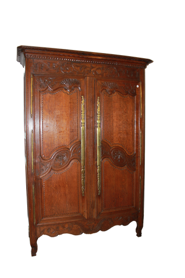 French Normandy wardrobe from the late 1700s with 2 richly carved doors in oak wood