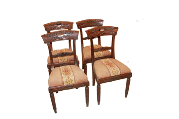 Group of 4 French Empire style chairs with richly carved backs