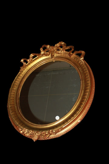 Specchiera ovale Francese in legno dorato foglia oro del 1800